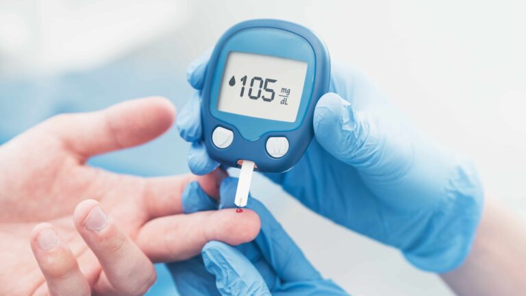 Checking blood sugar levels using a glucometer, essential for diabetes management and monitoring